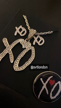 XO silver set includes silver xo pendant with free chain and silver xo earrings. This bundle also includes an xo pin. This bundle is also available with the gold set. Xo Earrings, Simi Haze, Xo Necklace, Xoxo Jewelry, Xo Jewelry, House Of Balloons, Spotify Premium, Jewelry Lookbook, Swaggy Outfits