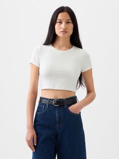 Supersoft modal-blend cropped top.  Round collar.  Short sleeves.  * Fit: Stretch-to-Fit.  Slim & stretchy that forms to your shape.  Ultra cropped, hits above the waist.  Models wearing Gap Round Collar, Crop Tshirt, Petite Size, Gap, White And Black, Short Sleeves, Off White, Collar, Crop Tops