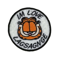 the badge for i'm love lasgagnee, which features a tiger face