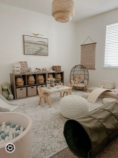 a child's playroom with toys and furniture