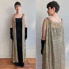 A truly incredible piece of work! This 1920s assuit piece is heavily embellished with metal over a cream mesh, it looks beautiful over this simple black 30s dress (not included).    - open front, no closures - very heavy!  - gold tone metal  - incredible geometric pattern   size: one size fits most, open overdress  condition: good vintage condition, a few breaks in the mesh (I only found two) and a small area of discoloration on the center back by the knees. See last photo for flaw. Overall in b 1920s Gown, 20s Fashion Dresses, 1920s Glamour, Turkey Fashion, 1920s Looks, 1920 Dress, 30s Dress, Stowe Vt, Egyptian Fashion