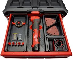 an open tool box with tools in it