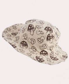 This Many Mushrooms Mushroom Hat will look cute  and stylin' with any hippie attire. Perfect for wearing at the beach, woods, or music festival. Designed with groovy, screen printed mushrooms and finished with a wire brim. Ethically made in Nepal. 100% Cotton. Natural. One size fits most. Inside circumference of this hat may vary slightly, but the base of the band typically measures 25 inches and 20 inches at the crown. Mushroom Stocking Hat, Cute Adjustable Beige Sun Hat, Cute Beige Wide Brim Hat, Hippie Spring Hats Adjustable Fit, Cute Adjustable Hats For Festivals, Hippie Spring Hats With Adjustable Fit, Cute Adjustable Festival Hats, Cute Adjustable Wide Brim Hat, Hippie Brimmed Hat For Spring