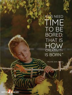 a young boy is smiling while holding onto a stick with leaves on it and the words, kids need time to be bored that is how creativity is born