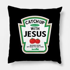 a black pillow with the words catch up with jesus on it and two tomatoes in front