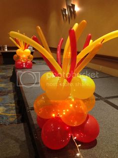 balloons and streamers are sitting on the table