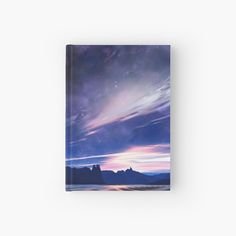 an image of the sky with clouds and stars in it hardcover book on white background