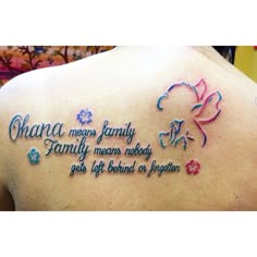 the back of a woman's shoulder with an inscription on it that says, ohana means family