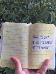 someone is holding up an open book with writing on it that says, when you can't find the sunshine be the sunshine