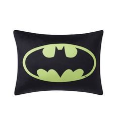 the batman pillow is shown in black and neon green, with a bat symbol on it