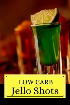 low carb jello shots in glasses with lemon wedges on the rim and text low carb jello shots