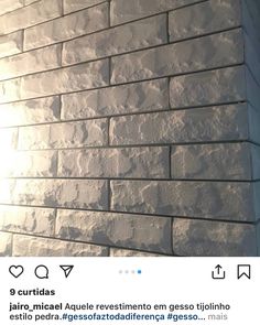 a brick wall is shown with the sun shining on it's side and behind it