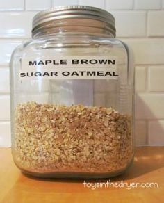 a jar filled with maple brown sugar oatmeal on top of a wooden table