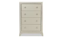 a white dresser with four drawers