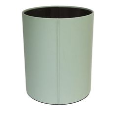 a light green vase with black trim on it