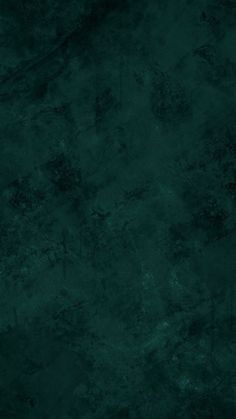 a dark green textured wallpaper background