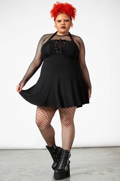 GOTHICA.- Soft, super stretch, flowing fabric.- Statement lace up detail. - Halter neck with D ring closure.- A-line silhouette.- Fitted.Model is 5ft 8 and wears a size 3XL. with KILLSTAR branding, 95% Rayon, 5% Elastane Spice Girls 90s, Curves And Confidence, 2010 Fashion, Fishnet Top, Flowing Fabric, Goth Outfits, Spice Girls, D Ring, Halter Neck