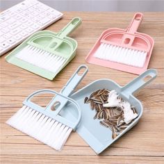 three different types of cleaning brushes and dust pans on a wooden table with text overlay