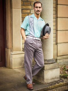 If you love fifties men's fashion, you will appreciate these pleated front 'Chuck' peg trousers, now available in a lightweight grey corduroy fabric. The pattern for our Chucks has been drafted from an original vintage pair, which gives these trousers a wealth of great 50s features: Tapered cut down to the ankles, with turn-up hem cuffs. Four pockets. Authentic metal zipper. Belt loops to house your favourite leather belt. A great pair of pants to coordinate with other 50s-era clothing such as o Male Retro Fashion, Goodwood Revival Mens, 1950s Fashion For Men, Retro Men Outfit, Men Retro Outfit, 60s Male Fashion, Mens 50s Fashion