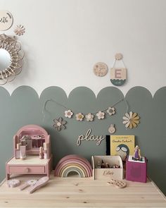 a child's playroom with toys and decor