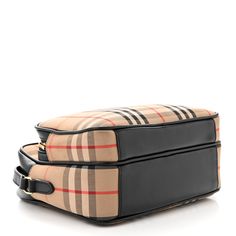 This is an authentic BURBERRY Calfskin Vintage Check Medium Camera Bag in Archive Beige. This sleek crossbody shoulder bag is crafted of Burberry vintage checked canvas, with black leather trim. The bag features a front zipper pocket and a black leather shoulder strap. The top zipper opens to a black fabric interior with pockets. Burberry Vintage, Leather Trim, Black Fabric, Crossbody Shoulder Bag, Leather Trims, Front Zipper, Camera Bag, Zipper Pocket, Calf Skin