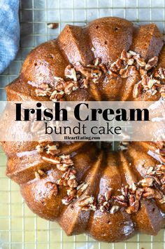 irish cream bundt cake on a cooling rack with pecans in the middle and text overlay