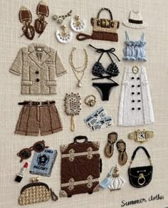 a close up of a piece of cloth with various items on it, including shoes and purses