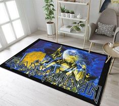 a living room area rug with an iron maiden painting on the floor in front of a window