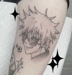 a black and white photo of an anime character on the leg