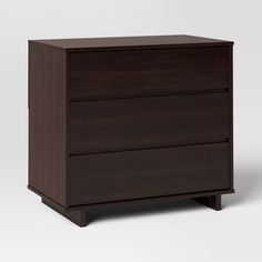 a dark brown dresser with two drawers