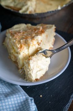 a piece of pie on a plate with a fork