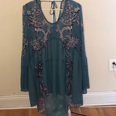 Free People (Intimately Line) Teal Patterned Tunic With Bell Sleeves Women’s Size Xs Never Worn !! 100% Polyester Easy Street Tunic Free People, Free People Ottoman Tunic, Bohemian Flowy V-neck Tunic, Bohemian Green V-neck Tunic, Flowy Tunic, Lace Tunic Tops, Ruffled Tunic, Free People Tunic, Beaded Blouse