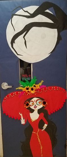 a door decorated with an image of a mexican woman