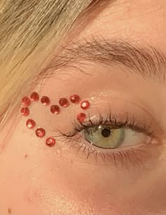 Gem Ideas For Face, Concert Jewel Makeup, Red Gemstone Eye Makeup, Cute Gem Makeup, Easy Makeup With Gems, Gems Around Eyes, Eras Tour Eye Gems, Easy Rhinestone Eye Makeup, Red Rhinestone Makeup Looks