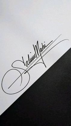 an autographed photograph of a man's name on a piece of paper