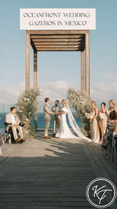 a couple getting married in front of an oceanfront wedding ceremony on the dock at gazebos in mexico