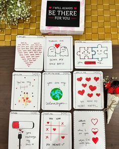 several cards with hearts and words written on them