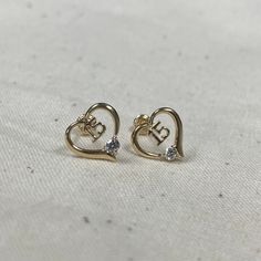 Ioka - Real 14K Yellow Gold Cubic Zirconia Stone Heart 15 anos 15 years Quinceanera Stud Screw Back Earrings ✅ ITEM SPECIFICATIONS: - Back Finding: Screw Back - Metal: 14K Gold (Not Gold Plated) ✅ PREMIUM 14K GOLD:  Our jewelry is crafted from durable high quality materials, gems, and stones; hand-stamped for authenticity as well as FTC law approved. Unlike cheap costume jewelry, our long lasting jewelry is easy to polish and and won't permanently tarnish or rust! ✅SHIPPING CONTENTS: -14K Gold S 15 Earrings Quinceanera, Quinceañera Earrings, Quince Earrings Gold, 14k Gold Heart Earrings With Birthstone For Anniversary, Personalized Heart Earrings For Valentine's Day Anniversary, Gold Heart Earrings With Diamond Accents For Wedding, Gold Heart Earrings With Diamond Accents For Anniversary, Personalized Heart Earrings For Anniversary On Mother's Day, Personalized Heart Earrings For Anniversary And Mother's Day