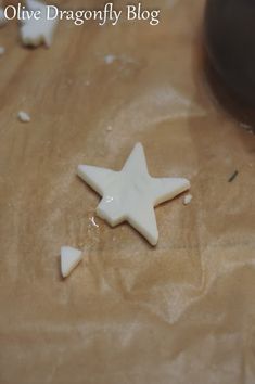 a star shaped cookie sitting on top of a table