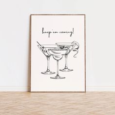 a black and white drawing of two martini glasses with the words keep me company on them