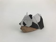 an origami ball is sitting on the ground