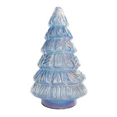 a clear glass christmas tree sitting on top of a table