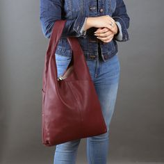 leather tote bag in burgundy color Burgundy Shoulder Bag With Zipper For Daily Use, Burgundy Shoulder Bag With Large Capacity For Daily Use, Daily Use Large Capacity Burgundy Shoulder Bag, Burgundy Bags With Zipper Closure For Daily Use, Burgundy Bags With Zipper For Daily Use, Burgundy Bag With Zipper Pocket For Daily Use, Travel-ready Burgundy Hobo Bag With Zipper Closure, Burgundy Shoulder Bag With Zipper Closure For Shopping, Burgundy Shoulder Bag For Errands With Zipper Closure