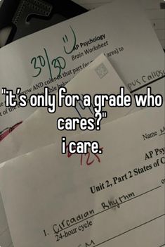 some papers with the words it's only for a grade who cares i care