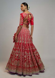 Editor's Note This exquisite lehenga set is a true embodiment of elegance and craftsmanship. Adorned with intricate hand and gold threadwork, skillfully crafted by artisans. Perfect for the bride's special day Festive Raw Silk Lehenga With Cutdana, Festive Raw Silk Lehenga With Cutdana Details, Dola Silk Sets With Cutdana For Reception, Festive Kundan Lehenga, Raw Silk Lehenga For Reception During Navratri, Traditional Drape Sets With Cutdana For Wedding, Transitional Raw Silk Sets For Reception, Intricate Embroidery Raw Silk Sharara For Reception, Diwali Silk Thread Sets With Cutdana Detail