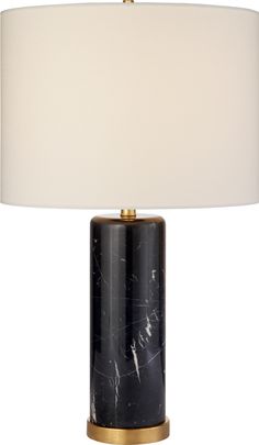 a black marble lamp with a white shade