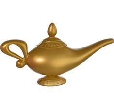 a golden teapot is sitting on a stand