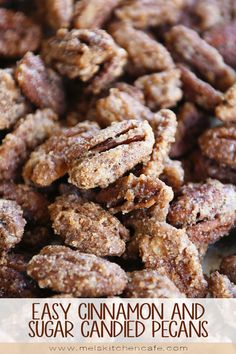 a pile of pecans sitting on top of a table next to another pile of nuts