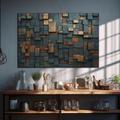 a wooden table topped with lots of vases and bowls next to a wall mounted art piece