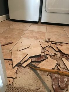 a kitchen floor that has been torn apart